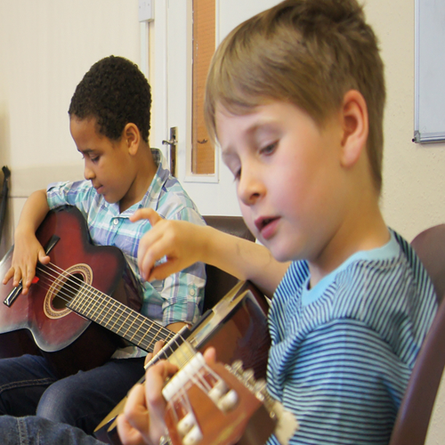 children playing guitar